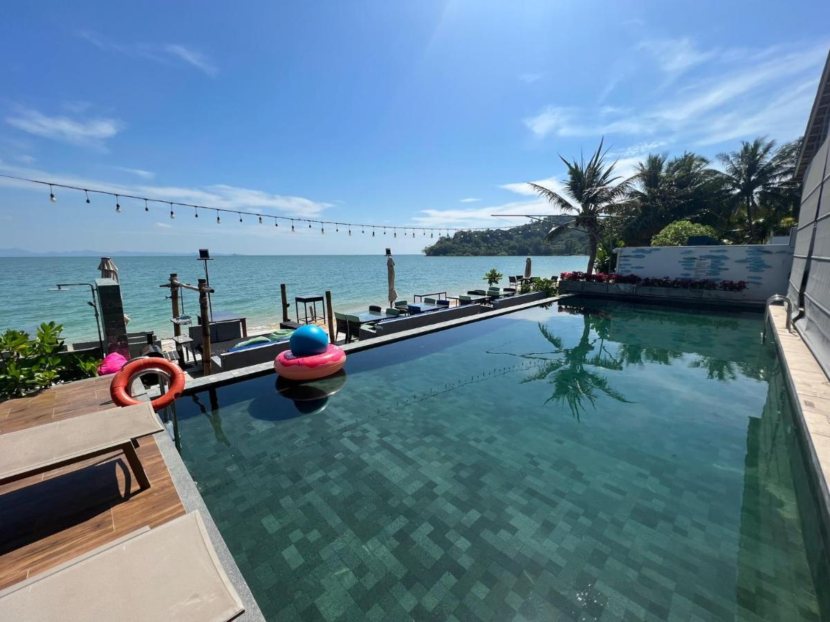 The Nchantra Beachfront Resort Phuket Exterior photo