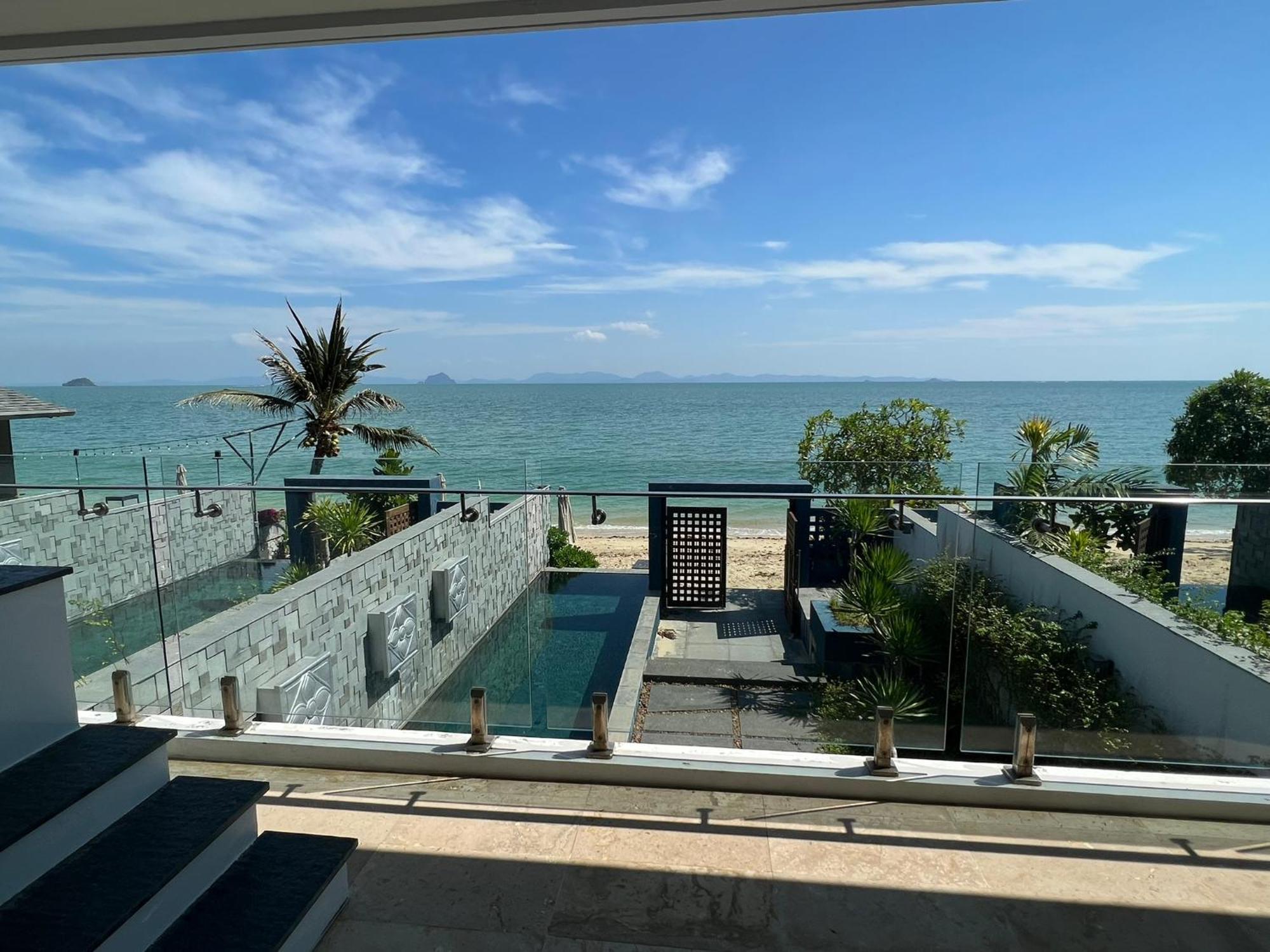 The Nchantra Beachfront Resort Phuket Exterior photo
