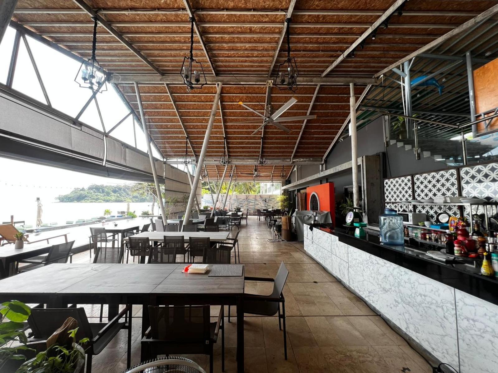 The Nchantra Beachfront Resort Phuket Exterior photo