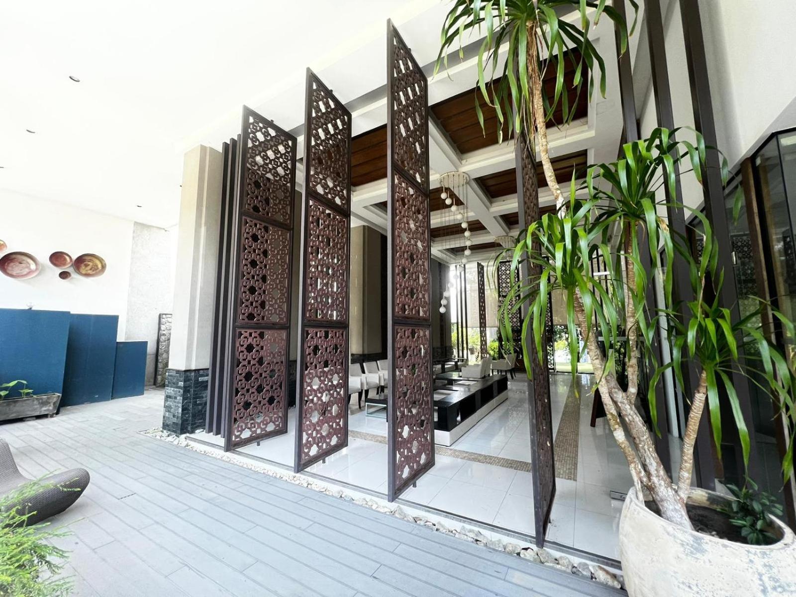 The Nchantra Beachfront Resort Phuket Exterior photo