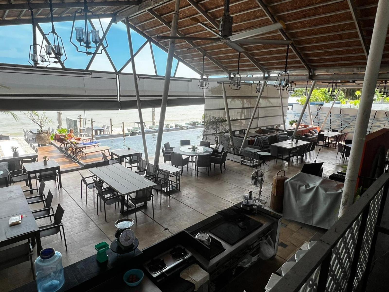 The Nchantra Beachfront Resort Phuket Exterior photo