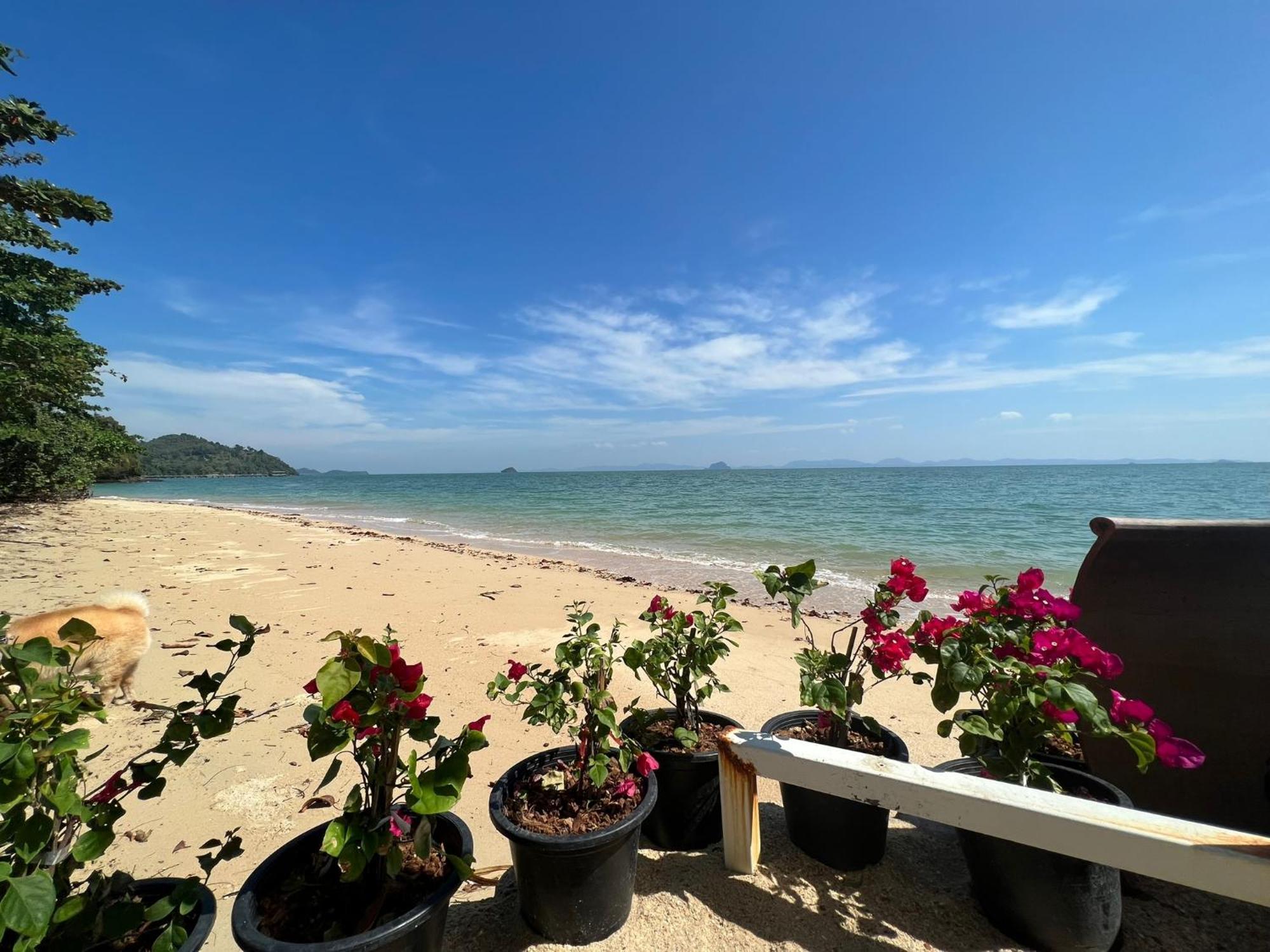 The Nchantra Beachfront Resort Phuket Exterior photo
