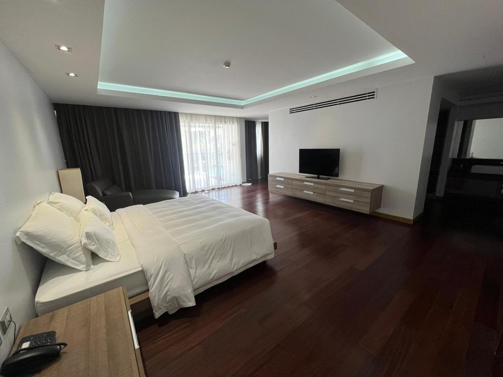 The Nchantra Beachfront Resort Phuket Exterior photo