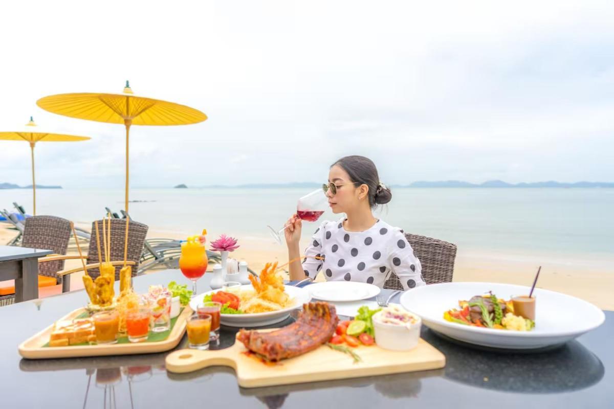 The Nchantra Beachfront Resort Phuket Exterior photo