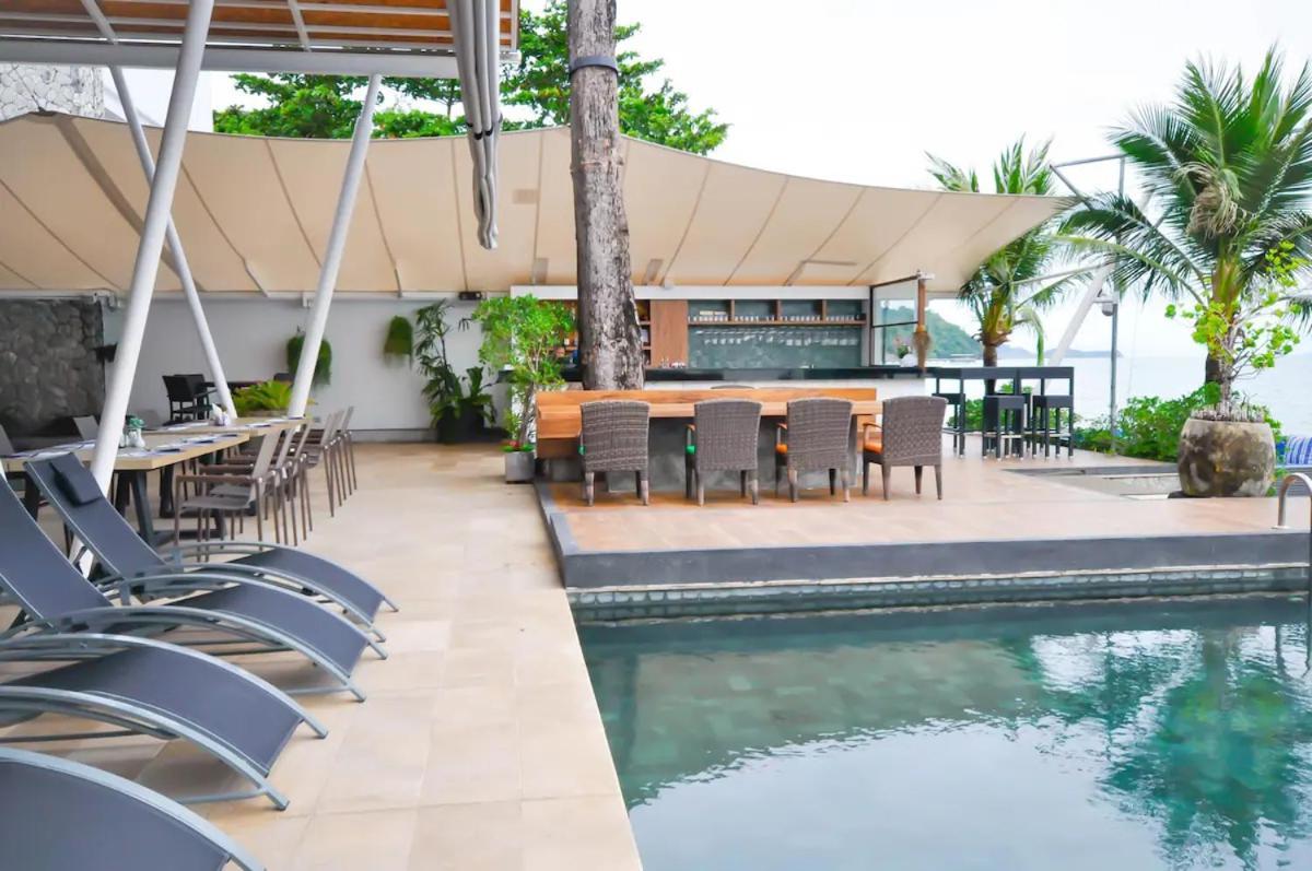 The Nchantra Beachfront Resort Phuket Exterior photo