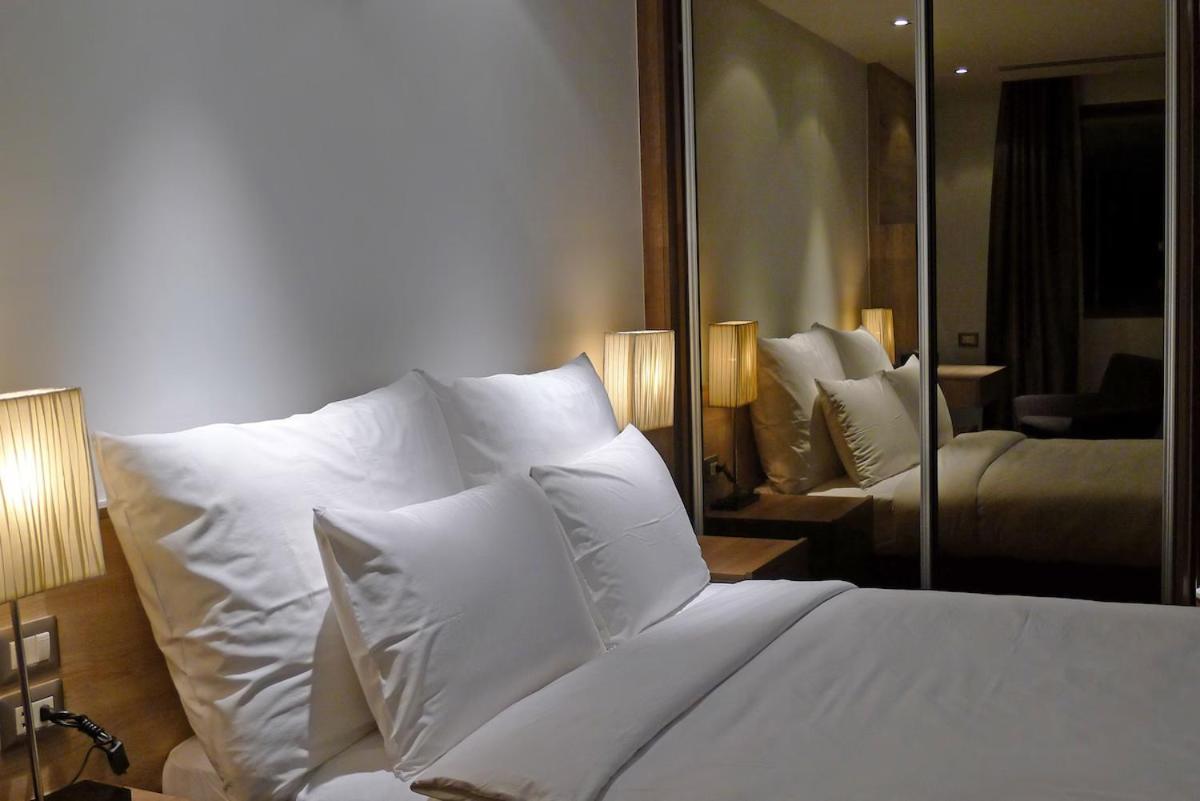 The Nchantra Beachfront Resort Phuket Exterior photo