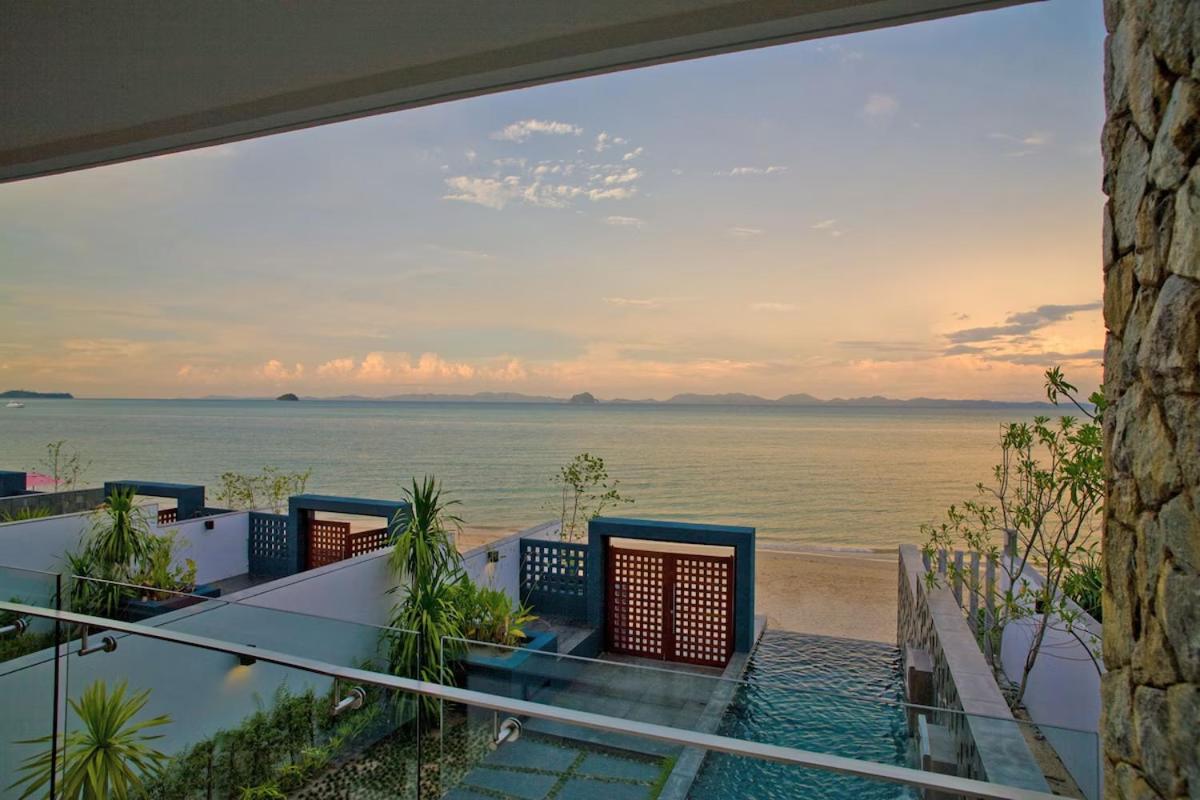 The Nchantra Beachfront Resort Phuket Exterior photo