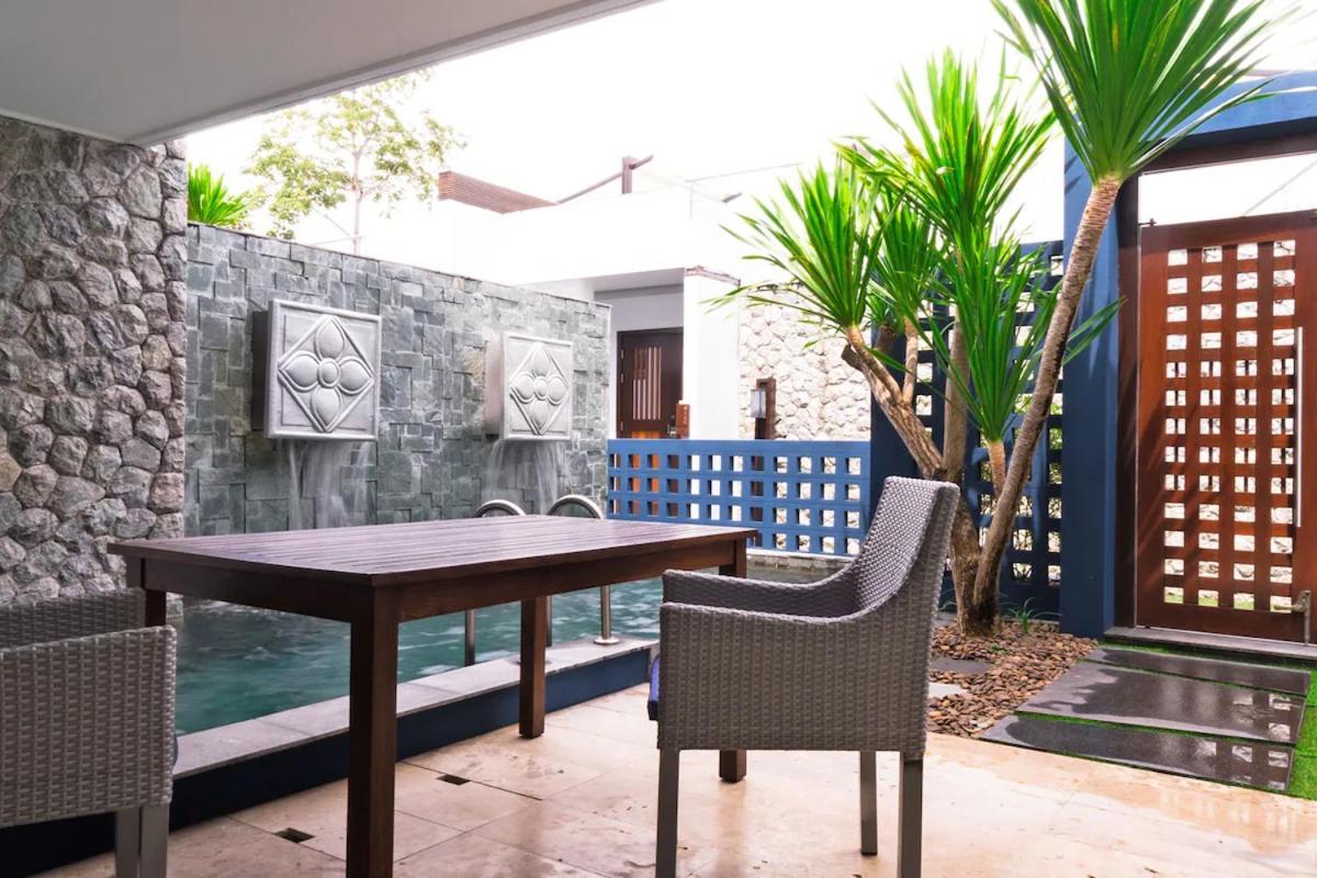 The Nchantra Beachfront Resort Phuket Exterior photo